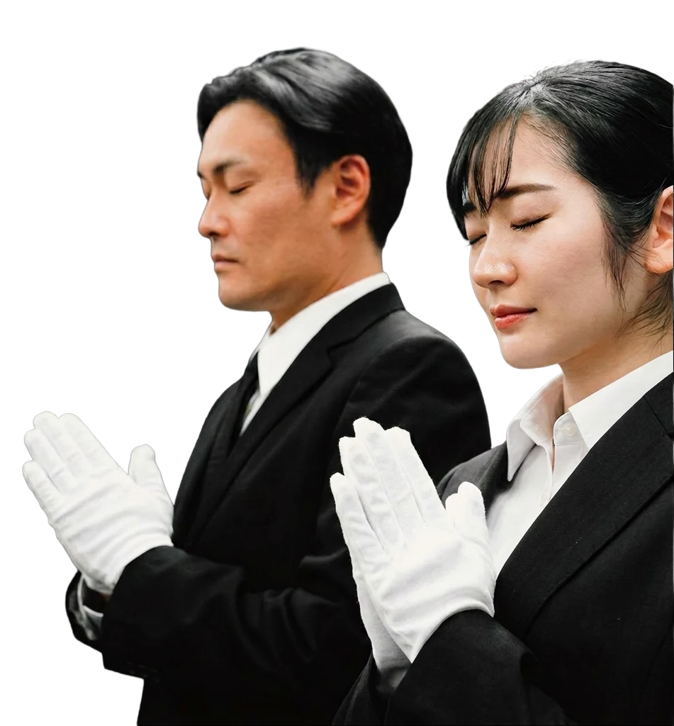 喪服姿で祈りを捧げるご遺族